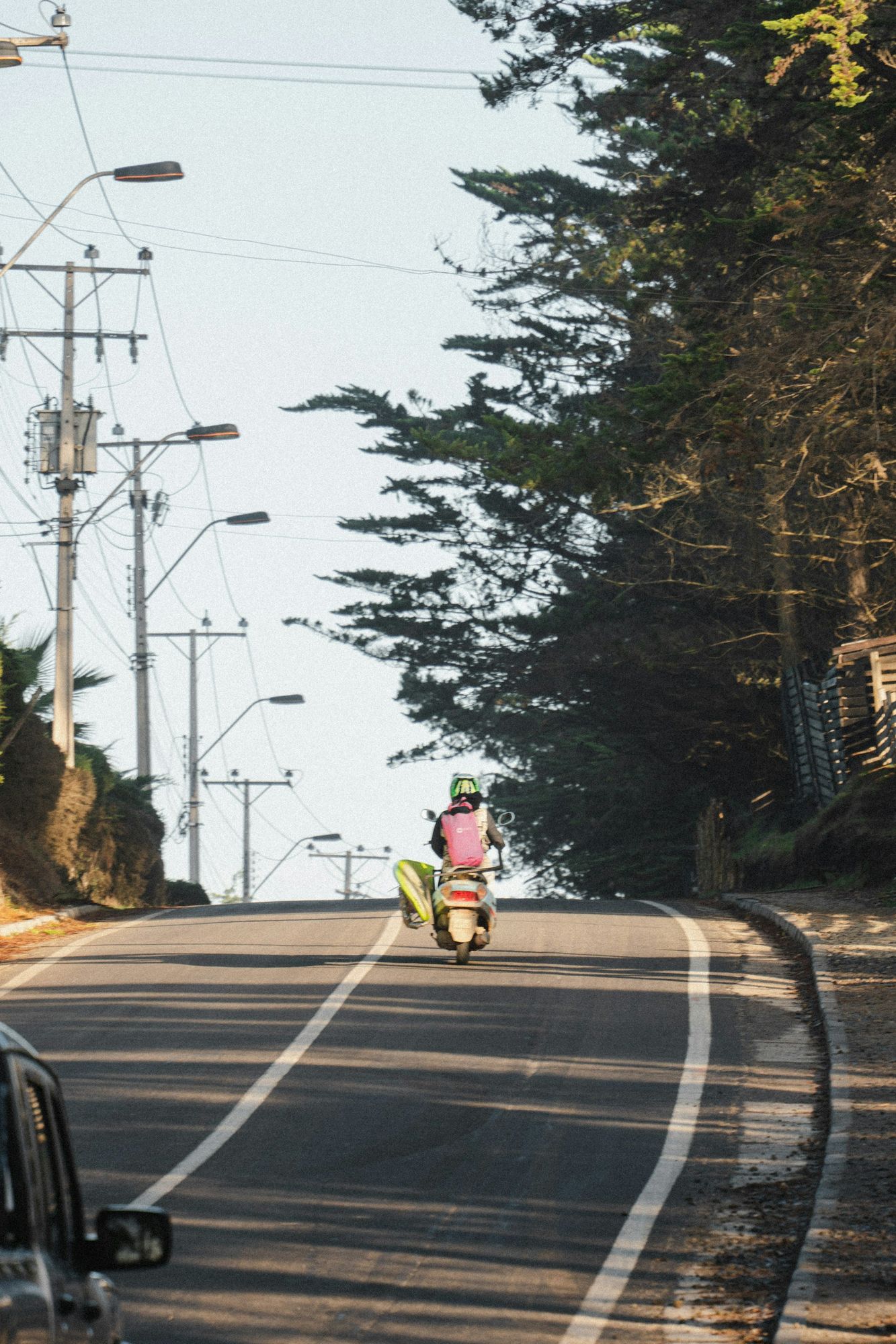 Motorcyclist riding a coastal road